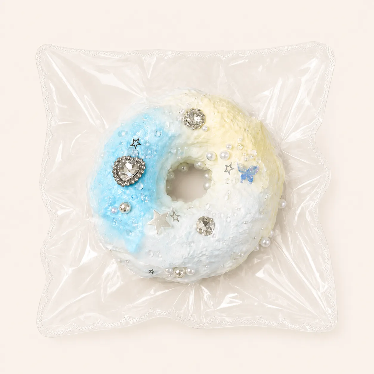 Juguete blandito con forma de rosquilla azul